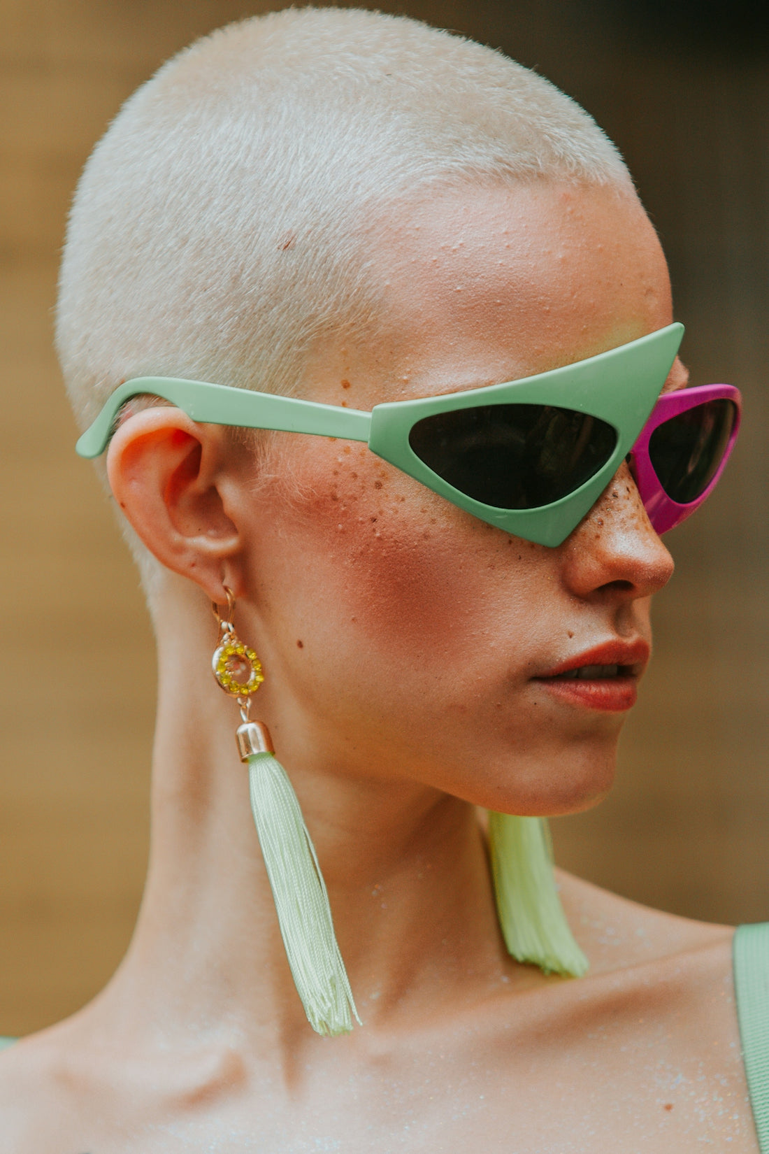 a close up of a person wearing sunglasses