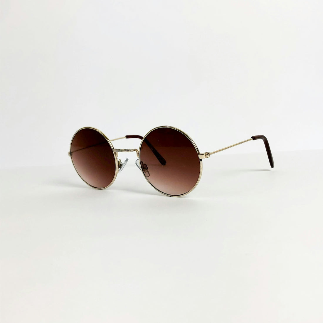 a pair of sunglasses on a white background