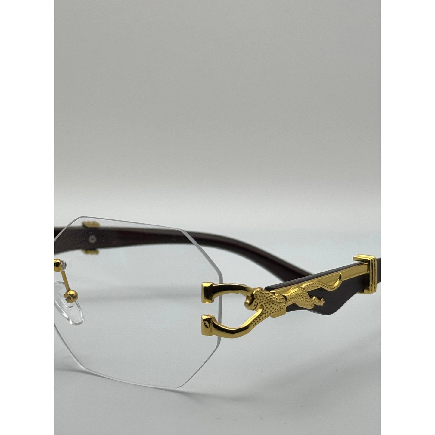 Luxury Rimless Clear Lens Hexagonal Eyeglasses with Gold Panther Detail - Stylish UV400 Unisex Designer Glasses